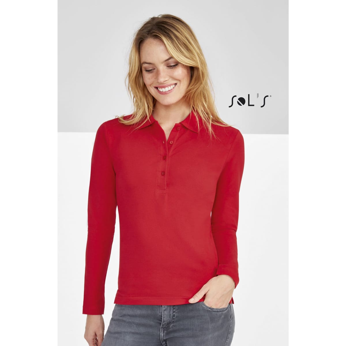 A red women's long sleeve polo shirt made of 100% combed ring spun cotton, featuring a logo.