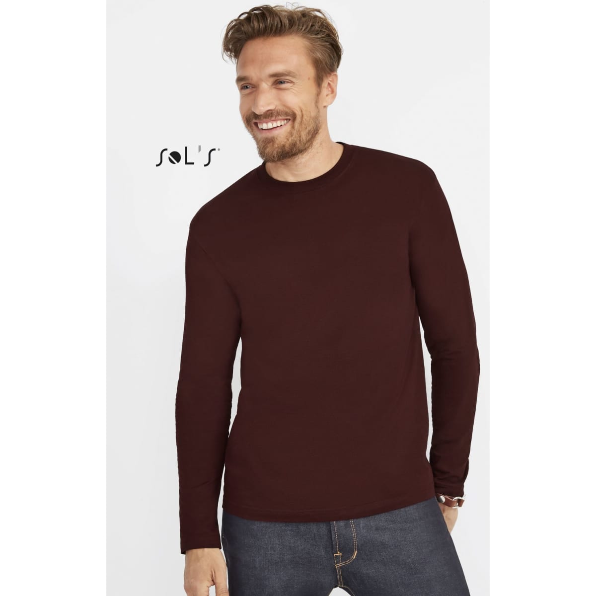 A burgundy long sleeve men's T-shirt with ribless cuffs, made from 100% semi combed ring spun cotton.