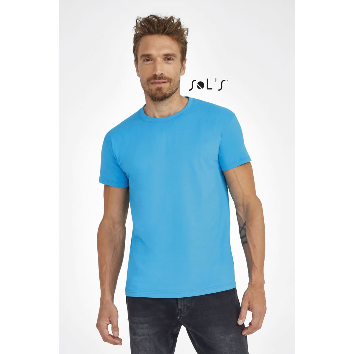 A blue round neck men's T-shirt made of 100% semi-combed ring-spun cotton, featuring a logo.