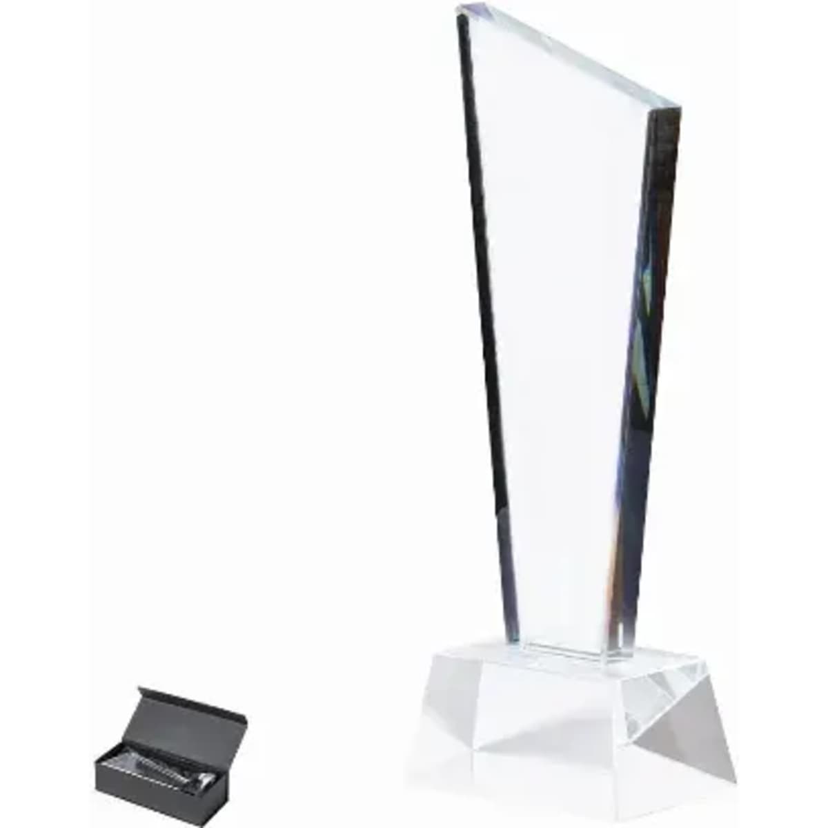 A clear acrylic award trophy with a triangular design, presented beside a black box.