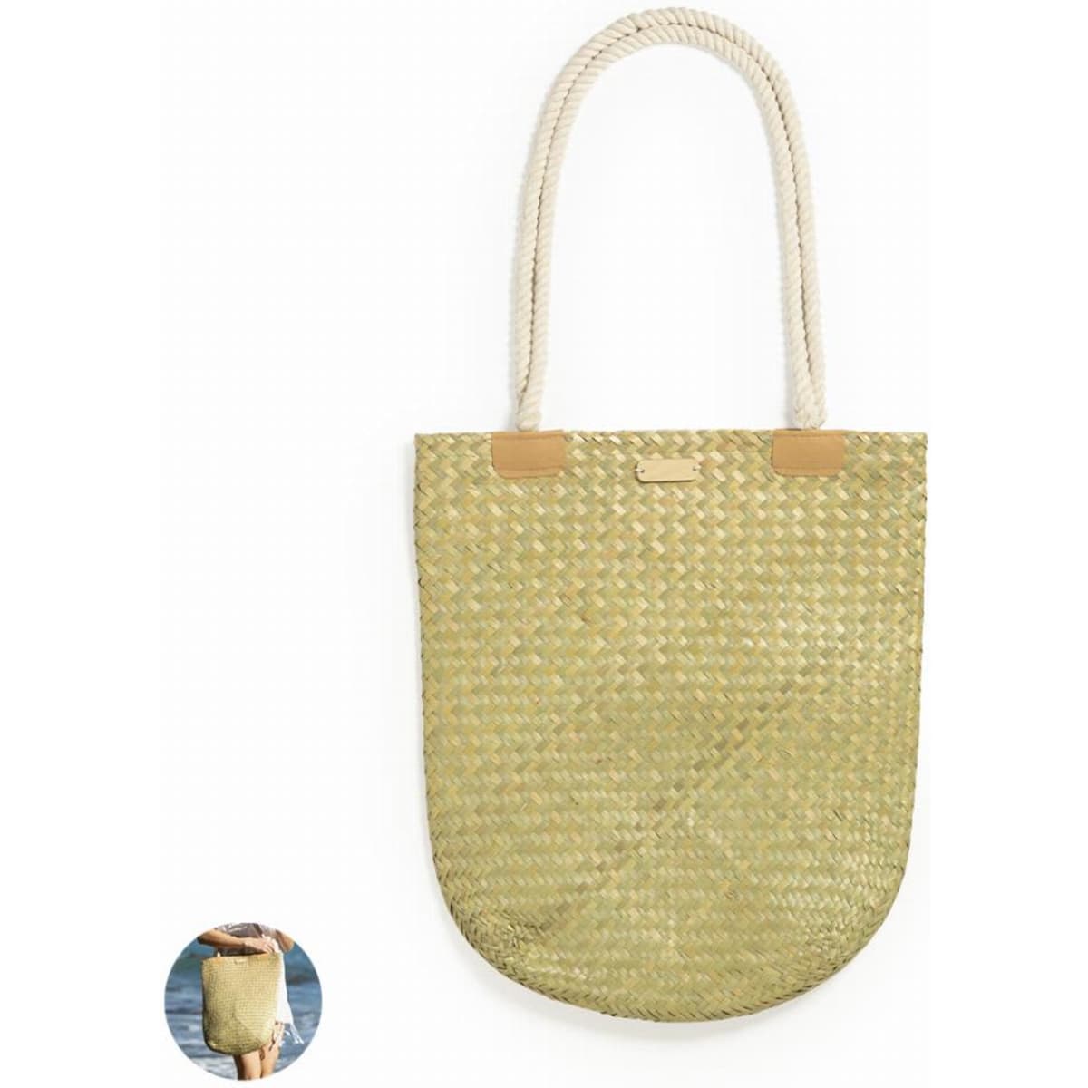 A woven straw tote bag with beige handles and a subtle logo. The bag has a light, natural colour.