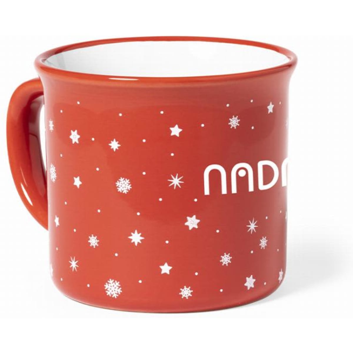 A red mug features a white interior adorned with scattered snowflakes and stars, along with a logo.