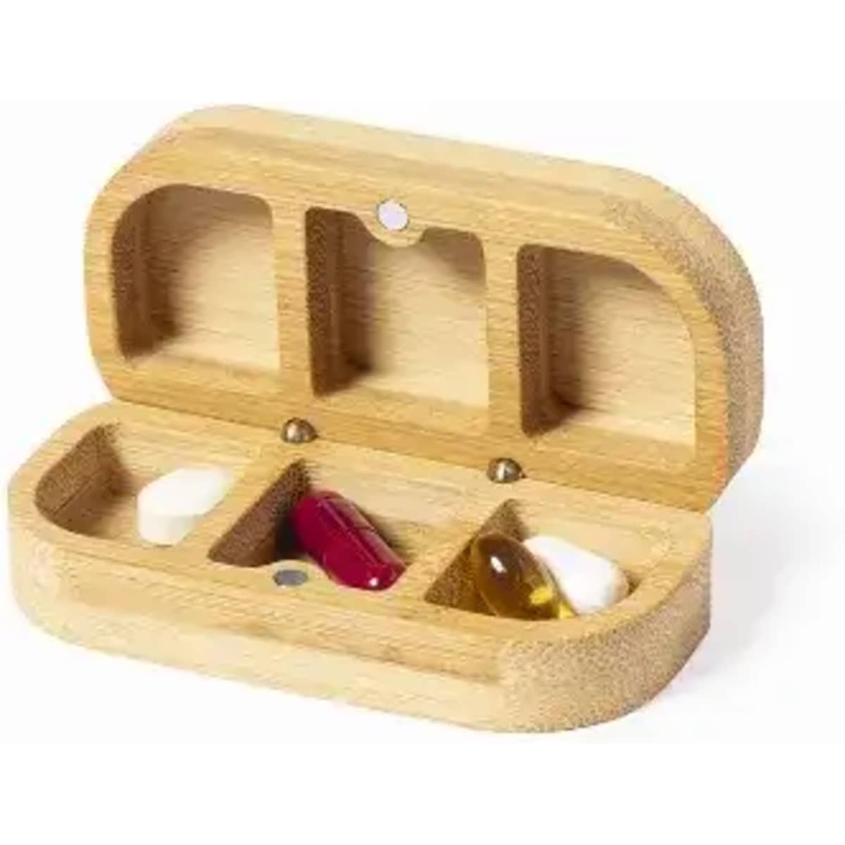 A wooden pill organiser with three compartments, containing two capsules and one tablet. It has a natural finish.