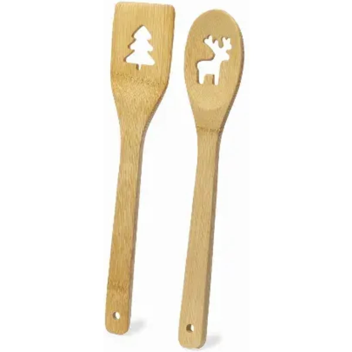 A set of two bamboo cooking spoons featuring cut-out designs of a tree and a reindeer.