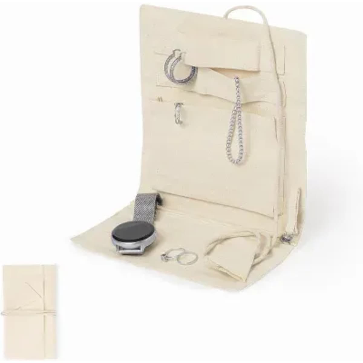A jewellery organiser in beige fabric, featuring multiple pockets and sections, with a watch and rings displayed.