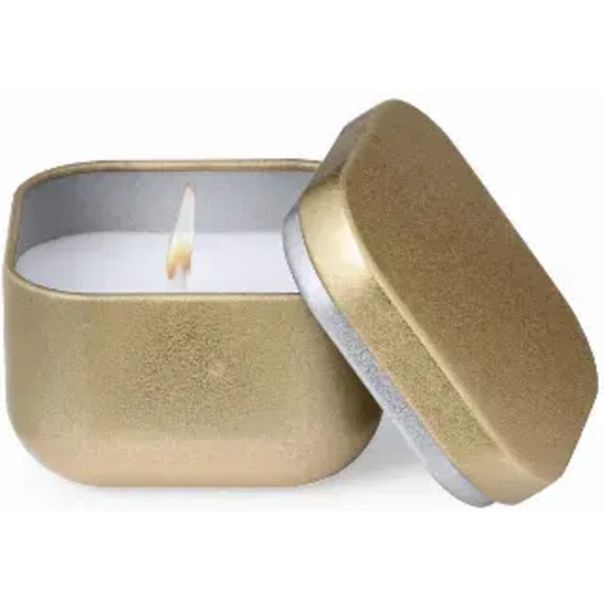 A candle in a gold tin with a silver lid, featuring a flame and white wax.