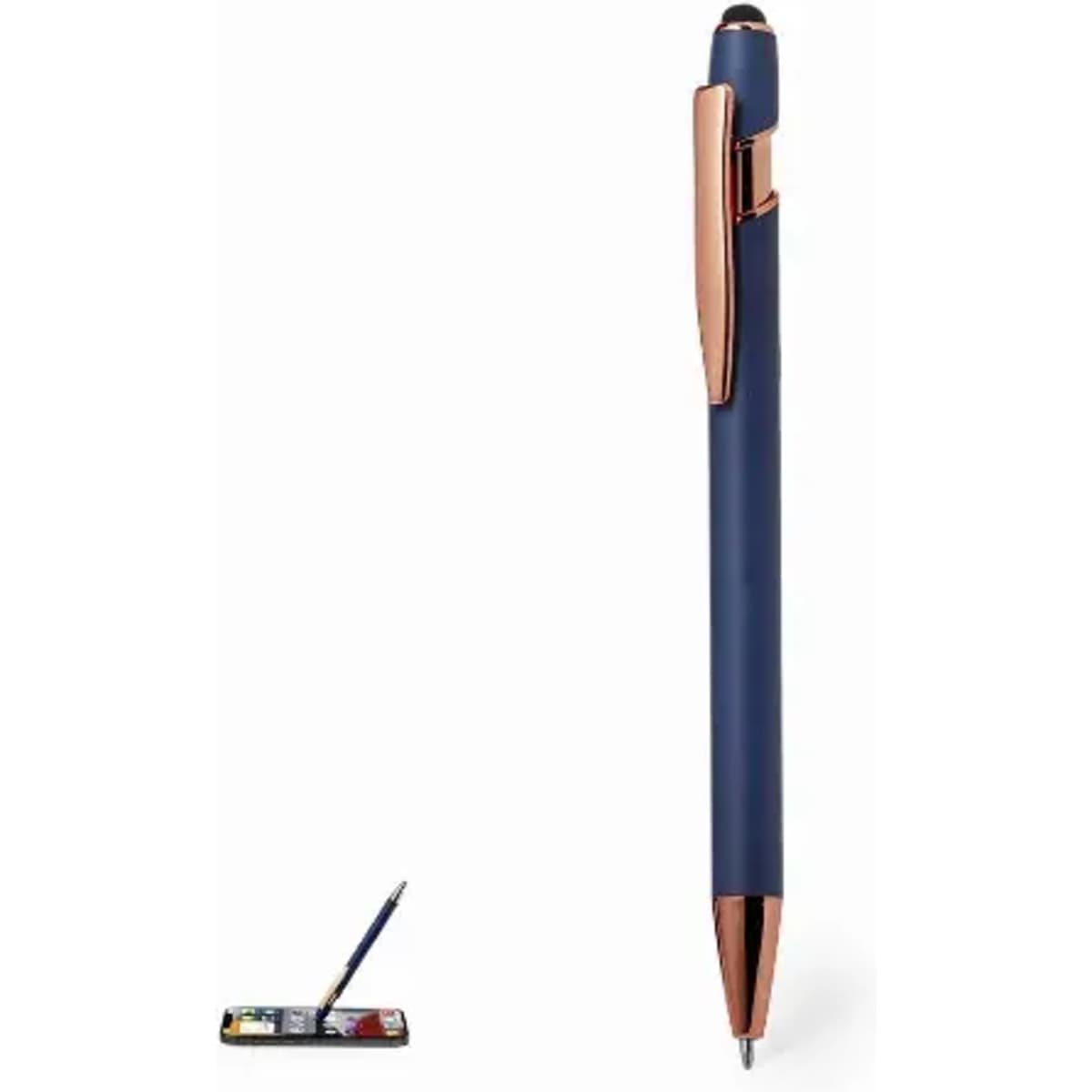 A navy blue pen with a rose gold clip, positioned upright next to a small palette of colours.