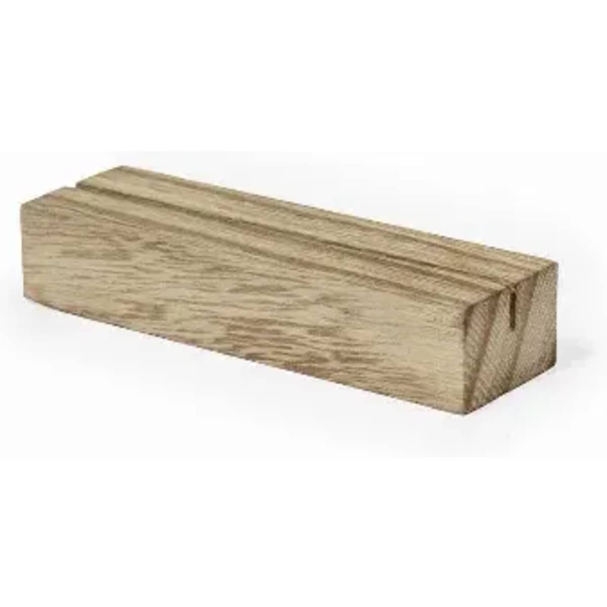 A wooden block with a smooth finish and visible grain pattern. The block is rectangular and light brown in colour.