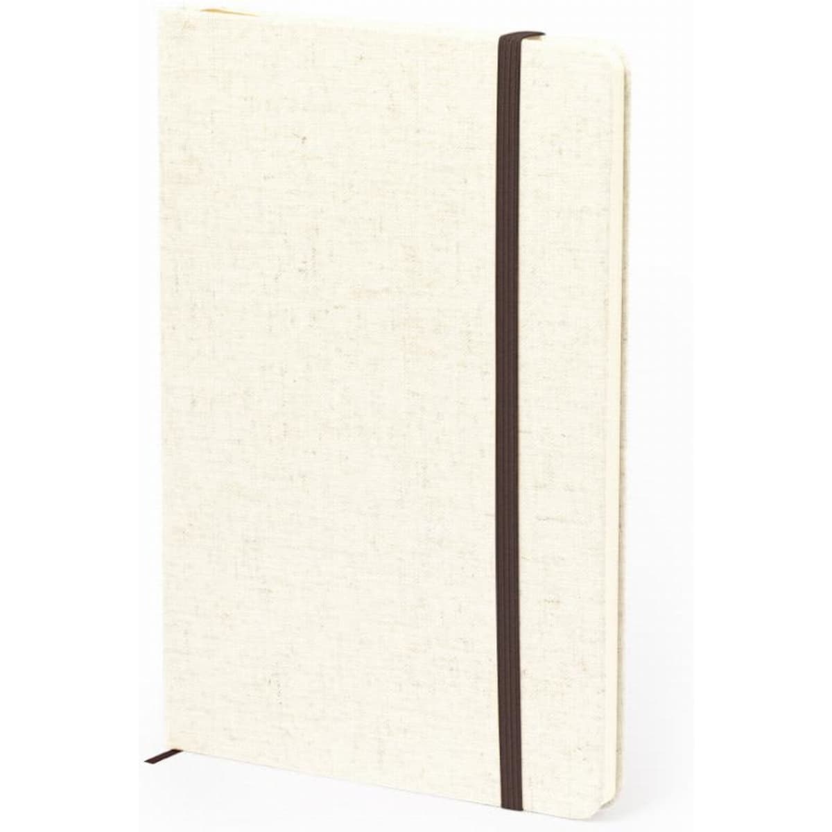 A notebook in cream-coloured fabric with a brown elastic closure and a textured surface.