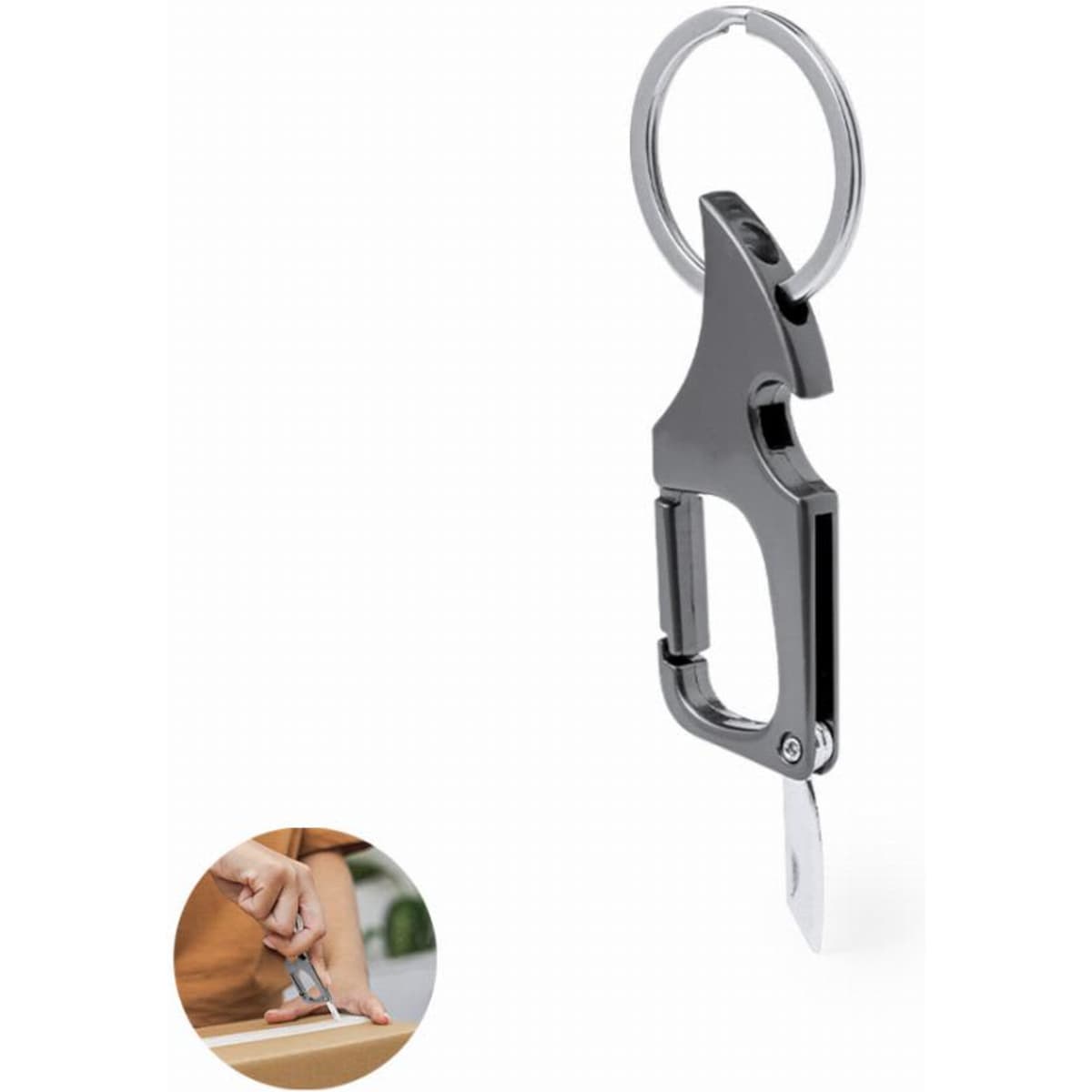 A keychain tool with a chrome finish, featuring a small retractable blade and a ring for attachment.