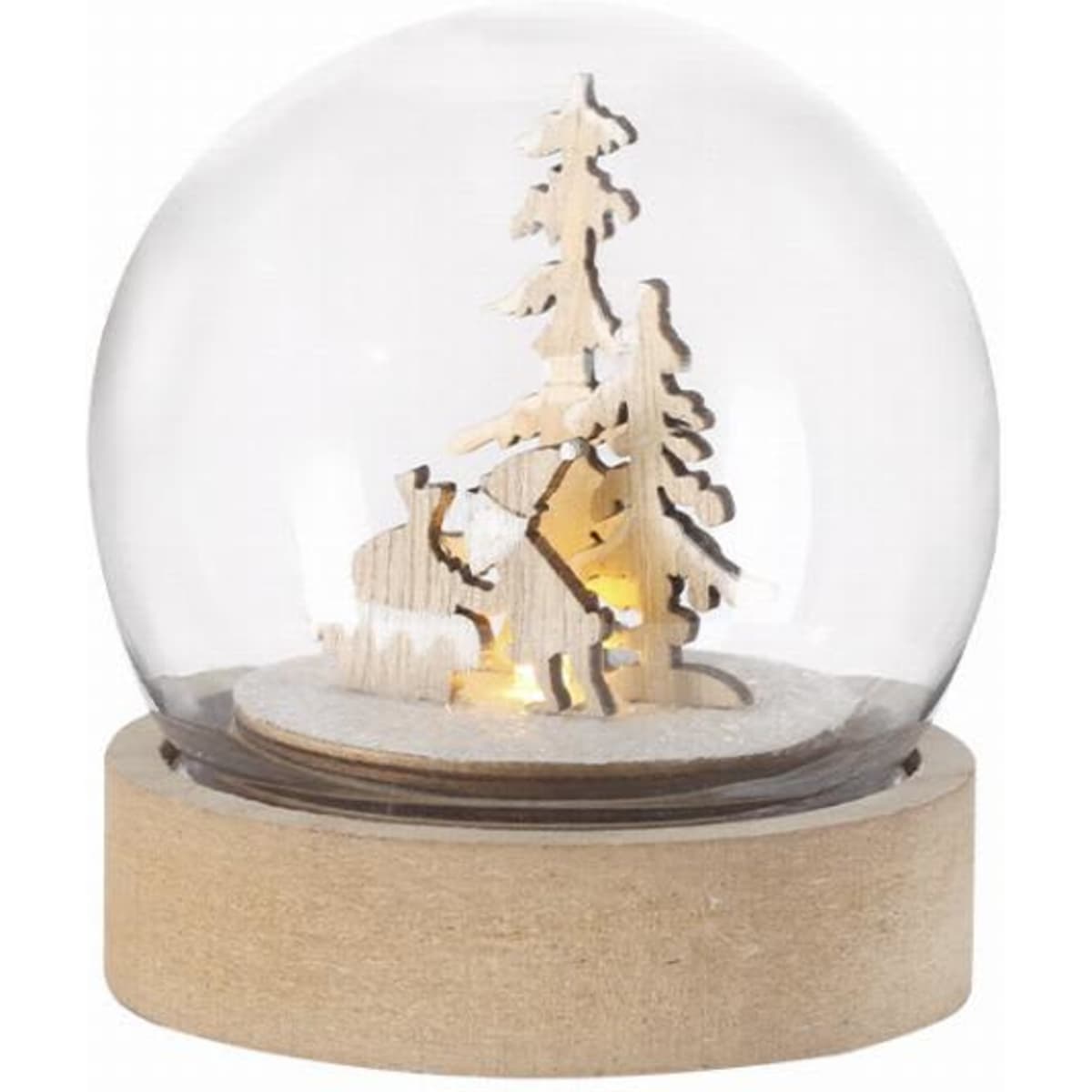 A snow globe featuring wooden figures of a tree and a person, sitting on a light-coloured base.