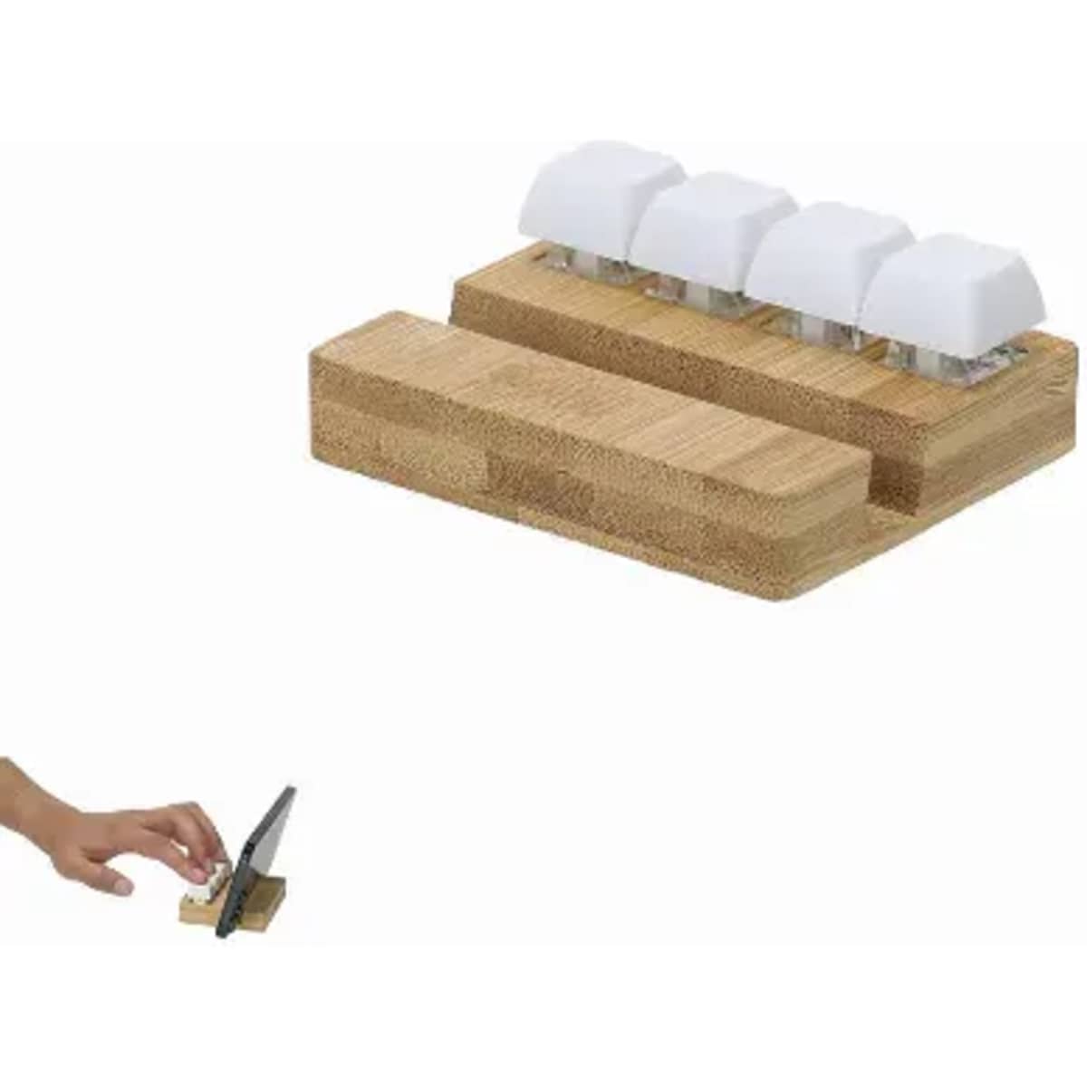 A bamboo charging station with four white charging pads and a wooden base, alongside a hand placing a device on it.