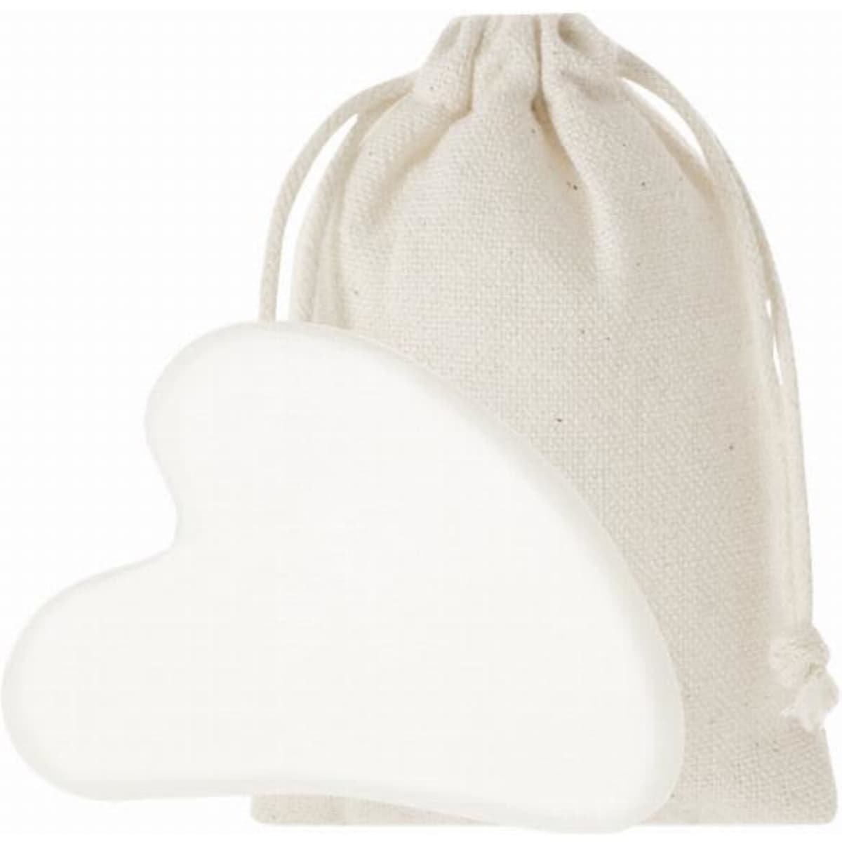 A heart-shaped white gua sha tool next to a natural fabric drawstring pouch.