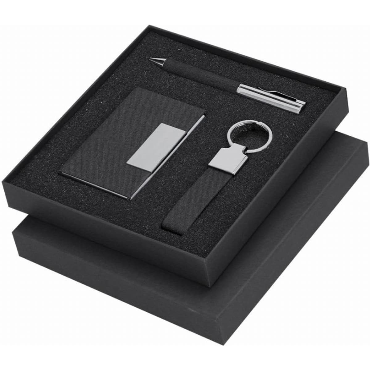 A gift set featuring a black card holder, keyring, and pen, presented in a black box with a textured insert.
