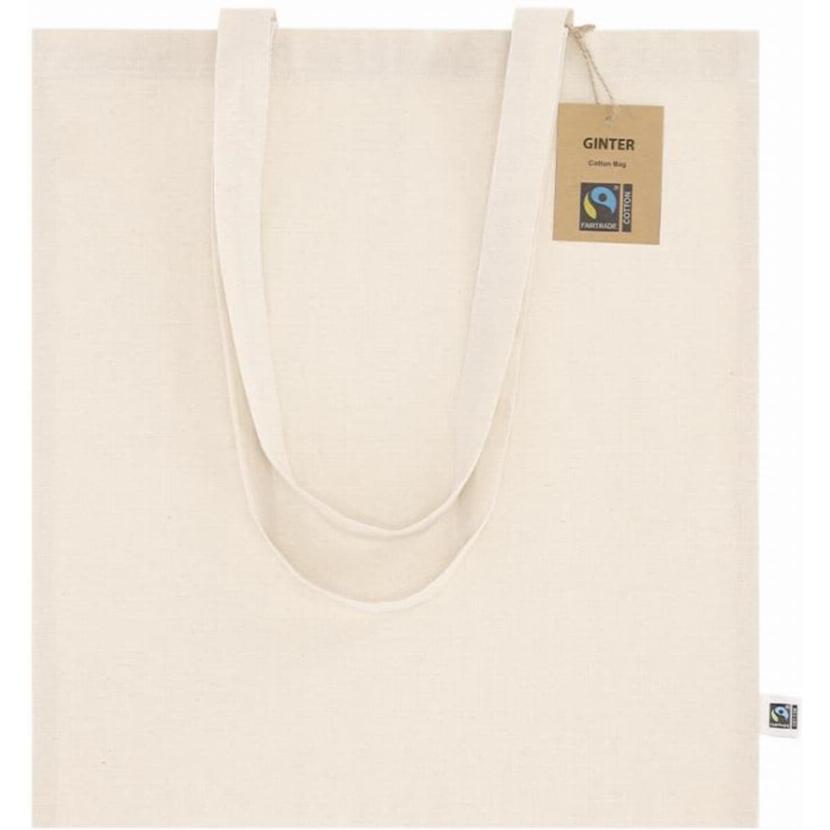 A cream-coloured tote bag with two handles and a tag. The bag has a Fairtrade logo and branding.