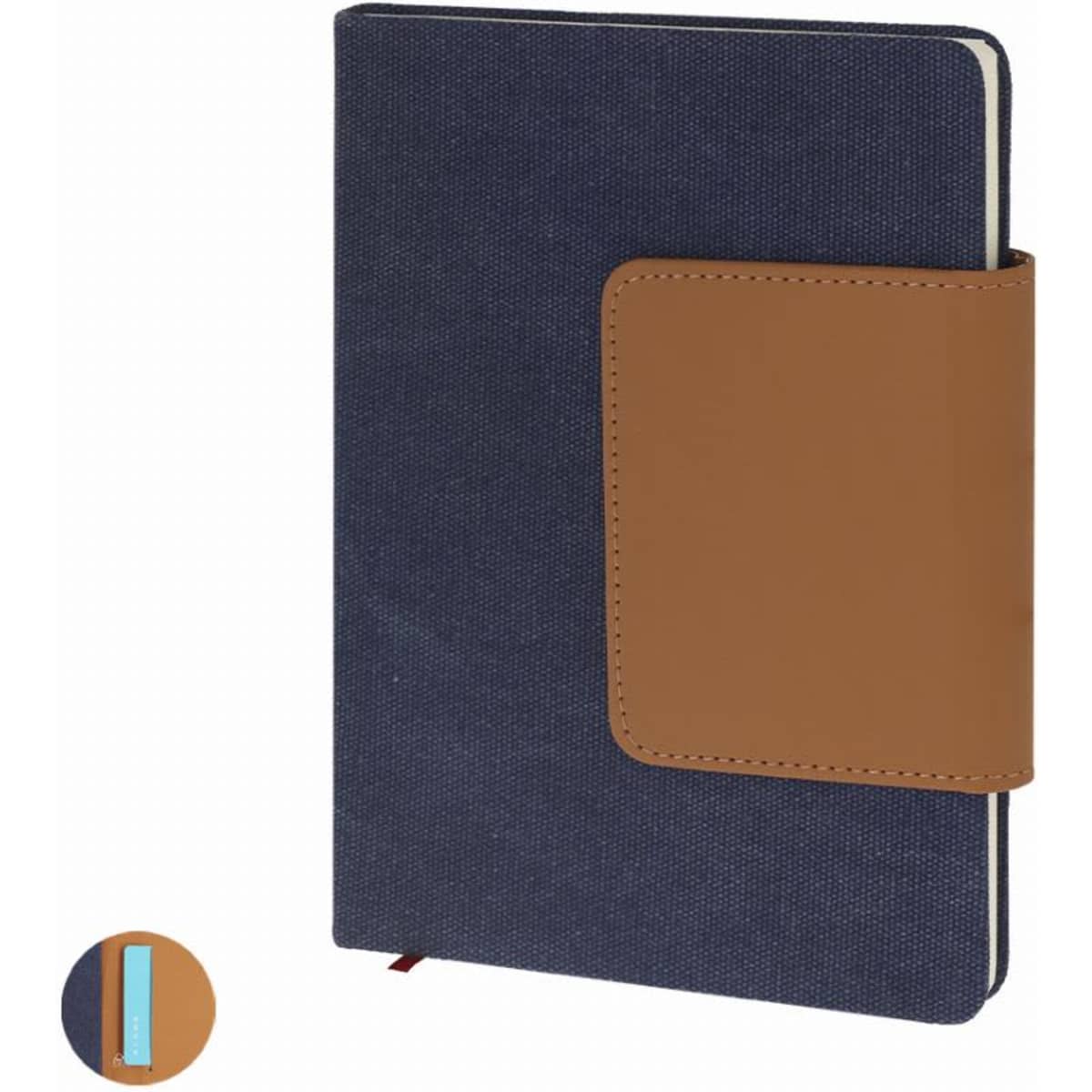 A notebook with a navy blue cover and a tan leather strap, featuring a logo on the front.