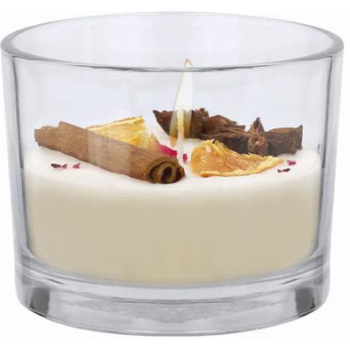 A candle in a clear glass holder, featuring a creamy white wax base with cinnamon sticks and dried fruit decorations.