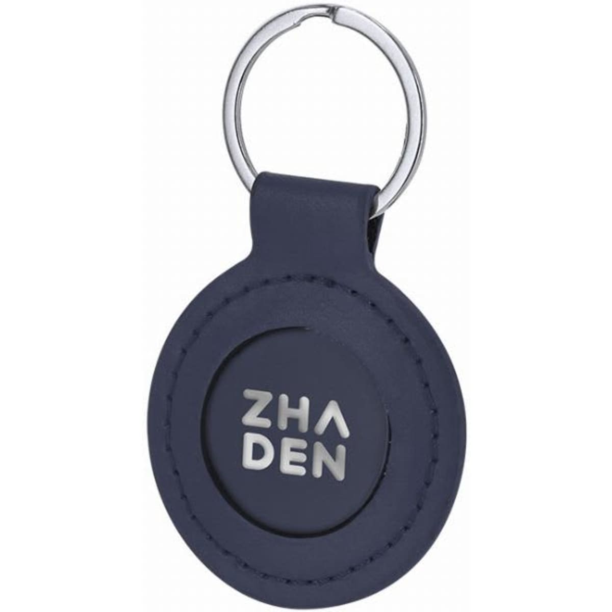 A keyring with a round navy blue design and a metallic silver logo in the centre.