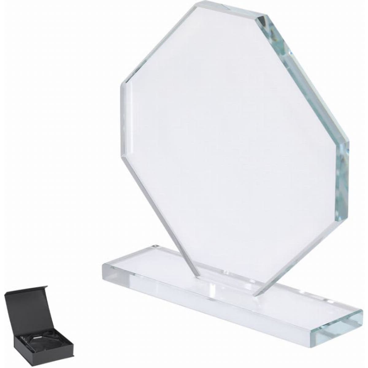 A clear octagonal trophy displayed on a rectangular base, placed beside a black box.
