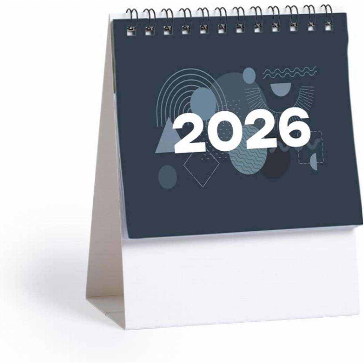 A spiral-bound desk calendar featuring a dark cover with geometric patterns and the year 2026 prominently displayed.