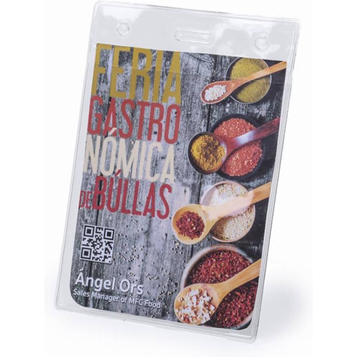 A promotional badge with a clear holder, featuring colourful spices in wooden spoons and a branding logo.