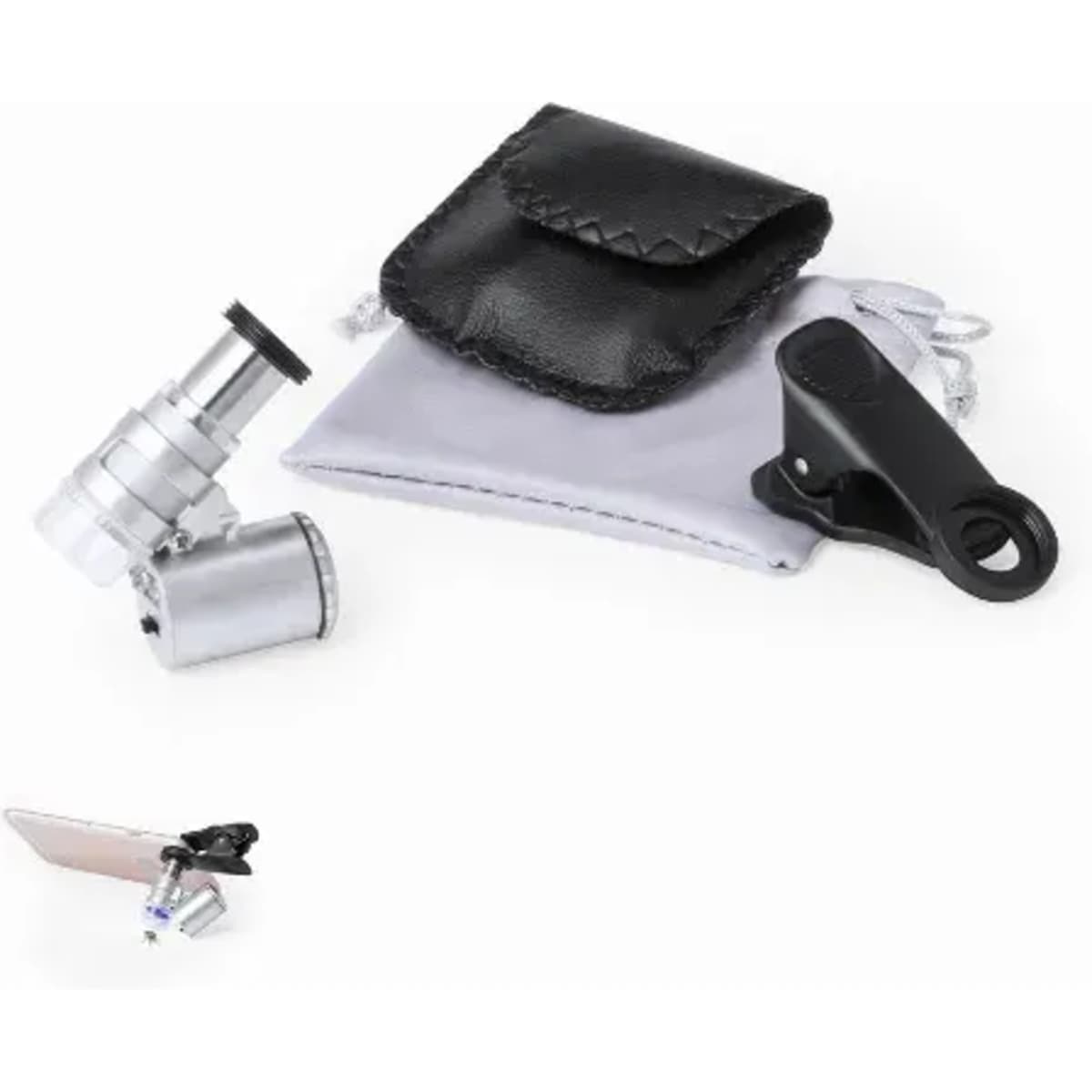 A compact telescope kit featuring a silver telescope, black clip, and grey pouch for storage.