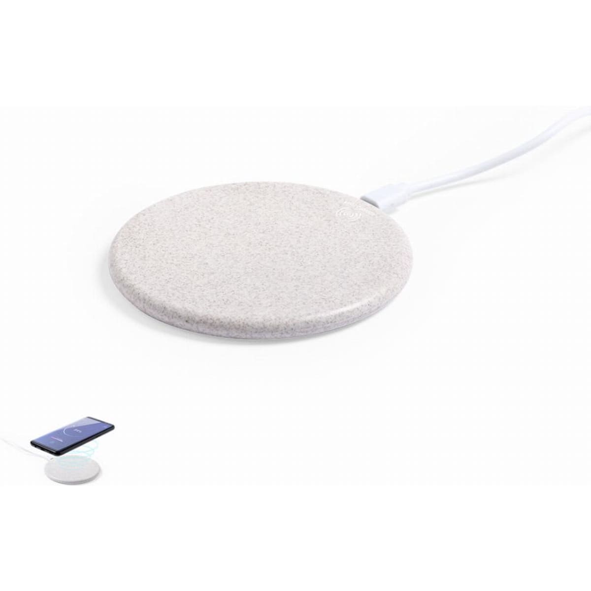 A wireless charging pad in a smooth, light grey finish. It features a cable connected to its base.