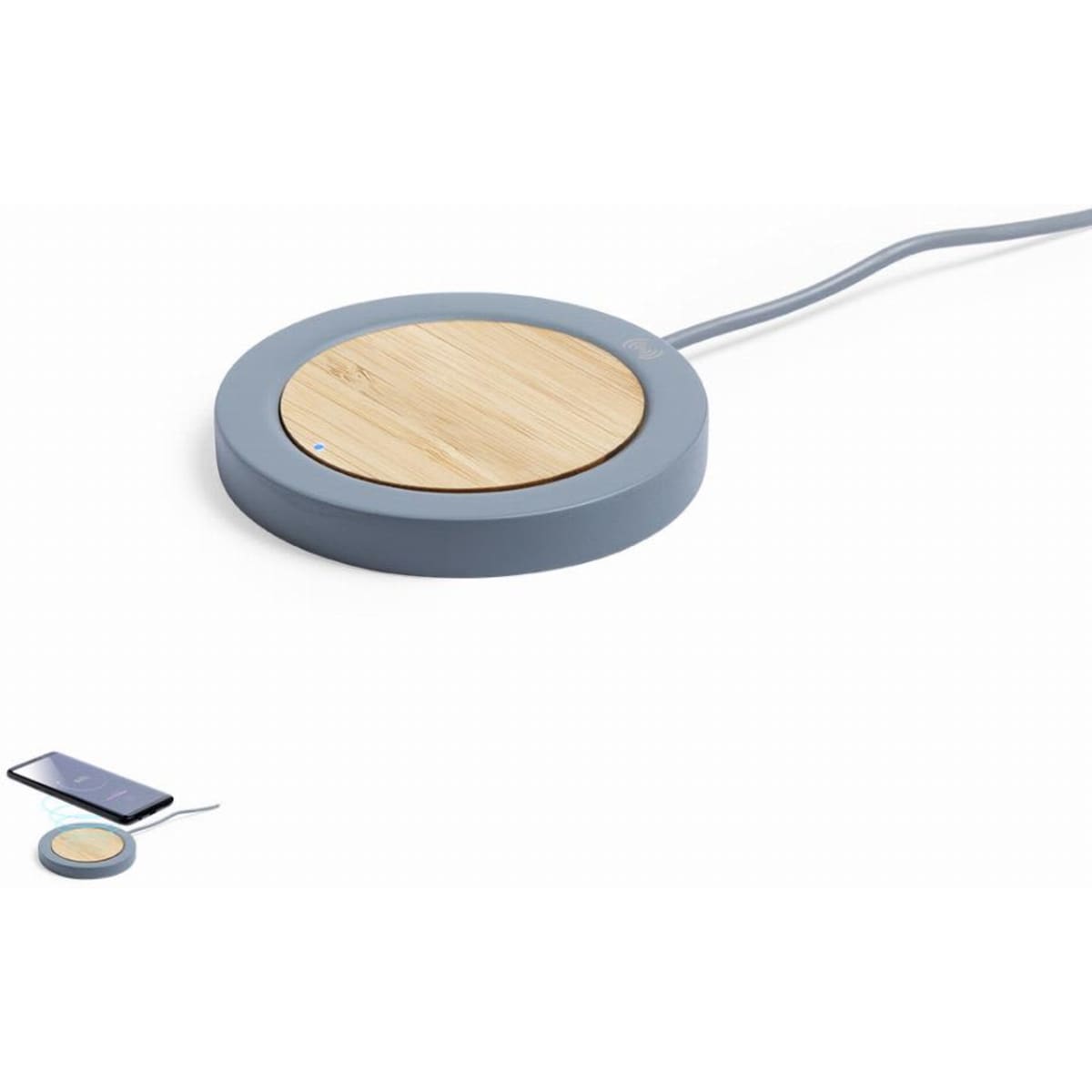 A wireless charger with a grey circular base and a bamboo charging surface, featuring a cable for power connection.