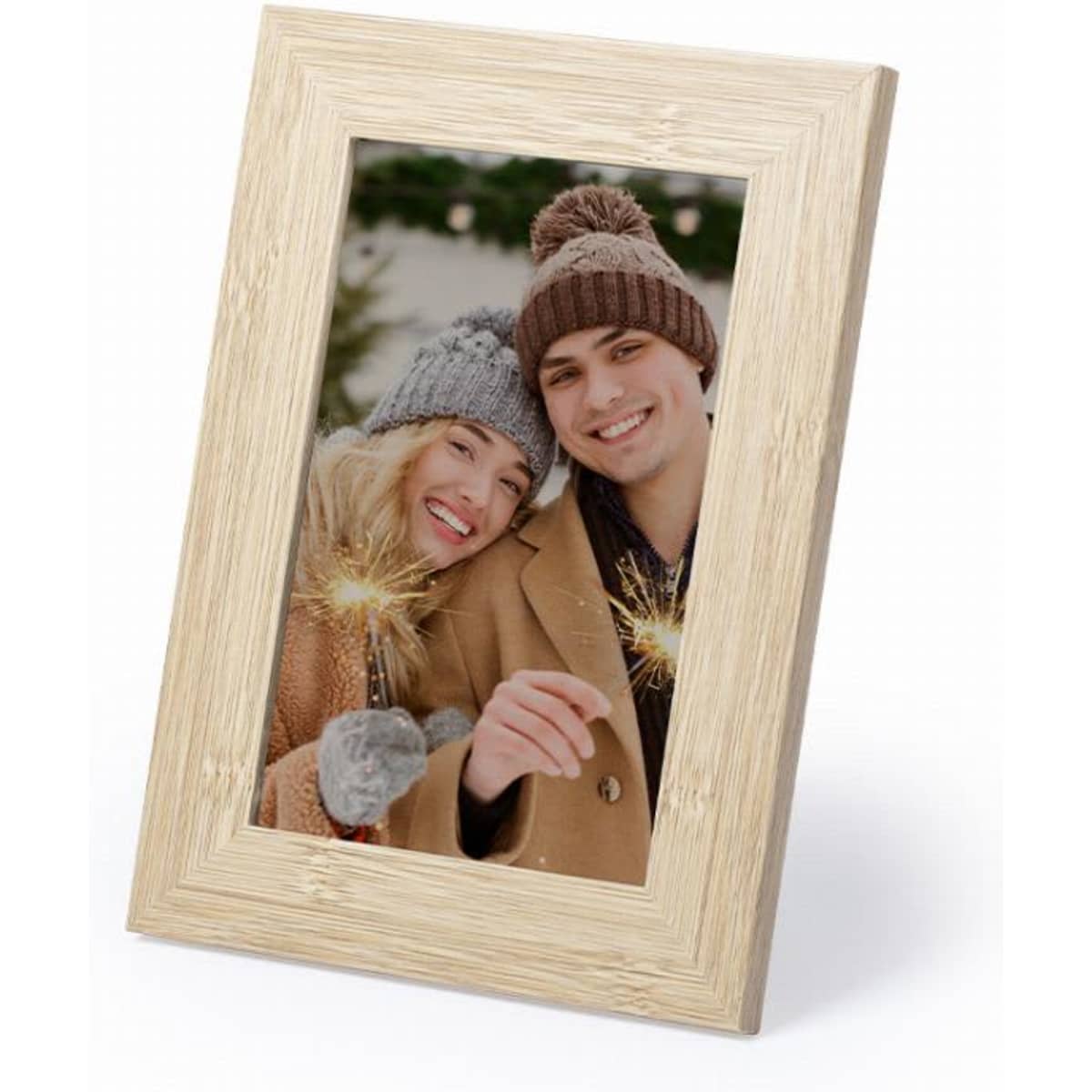 A photo frame with a wooden texture, featuring a smiling couple holding sparklers. The frame is angled for display.