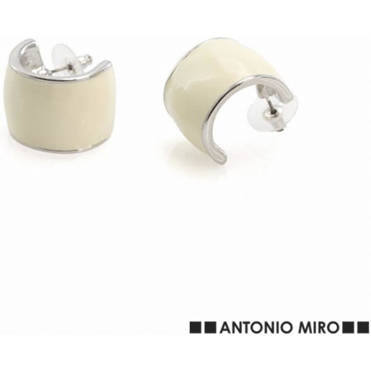 A pair of cream-coloured earrings with a shiny silver setting, featuring a curved design. Includes a logo in the corner.