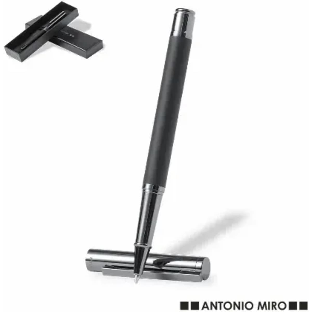 A sleek black pen with a chrome tip, resting on a chrome cap, displayed alongside a black presentation box.