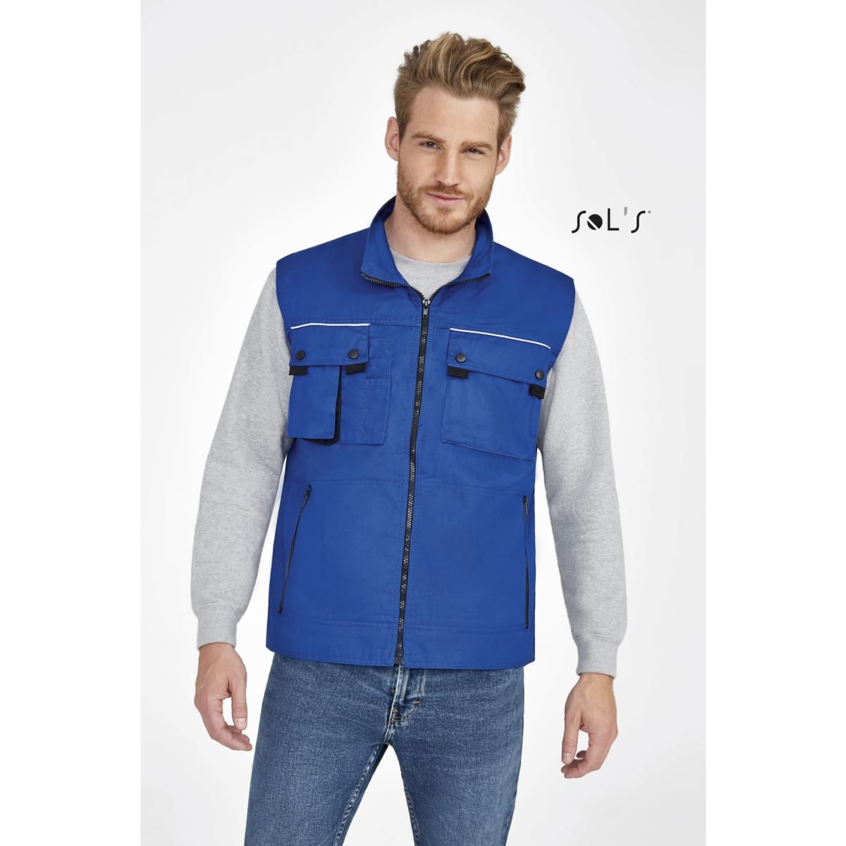 A blue men's vest with reflective piping and six exterior pockets, featuring a branding logo.