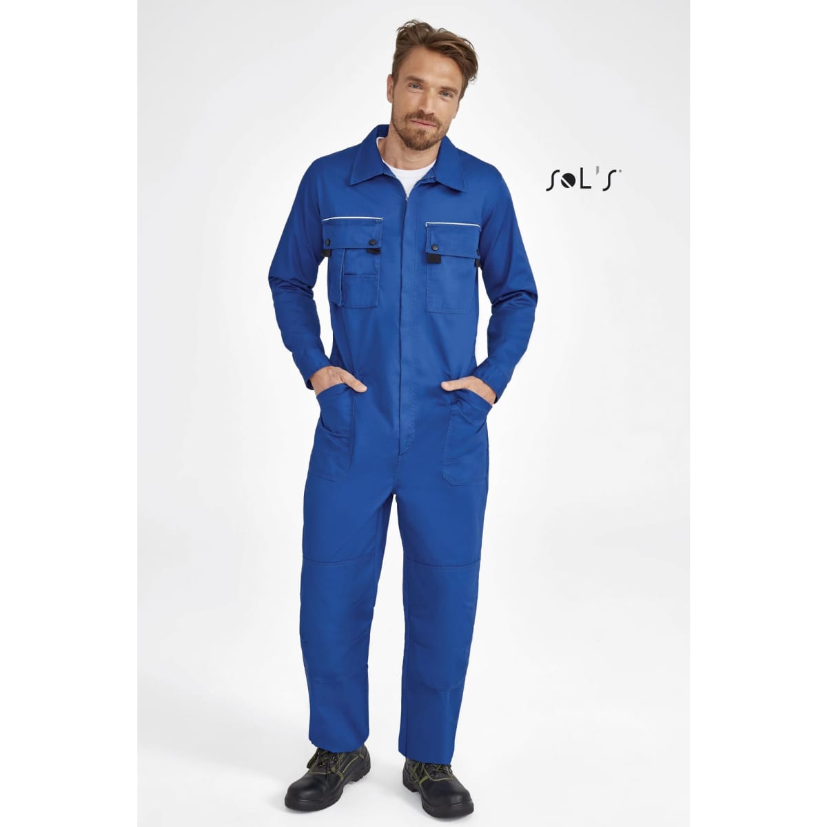 A blue overall featuring multiple pockets and knee pads, with zips and a logo. Suitable for various tasks.