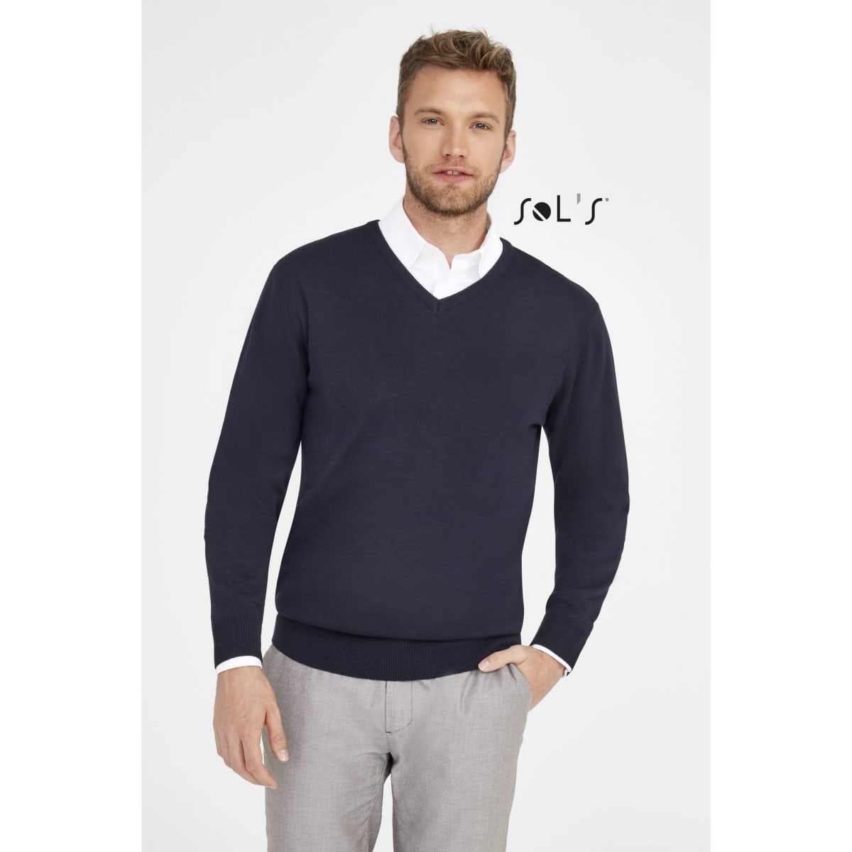 A navy V-neck jumper for men, made from acrylic and cotton, showcased on a model against a plain background.