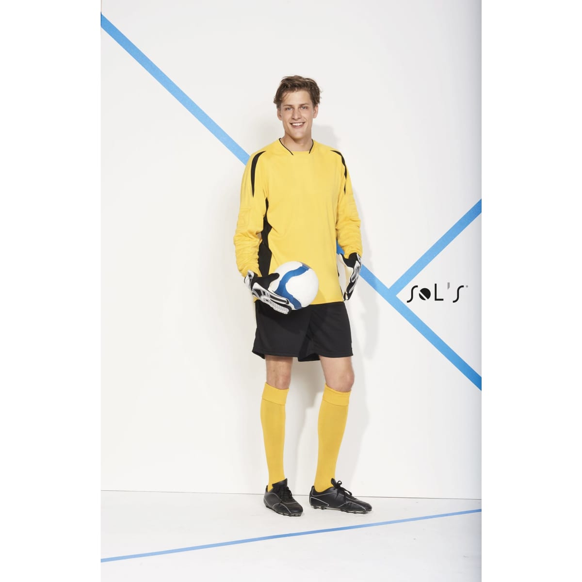 A soccer goalkeeper shirt in bright yellow with black accents, paired with black shorts and goalkeeper gloves.