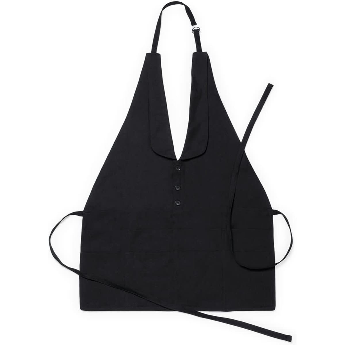 A black apron features a V-neck design, buttons at the front, and long ties for secure fastening.
