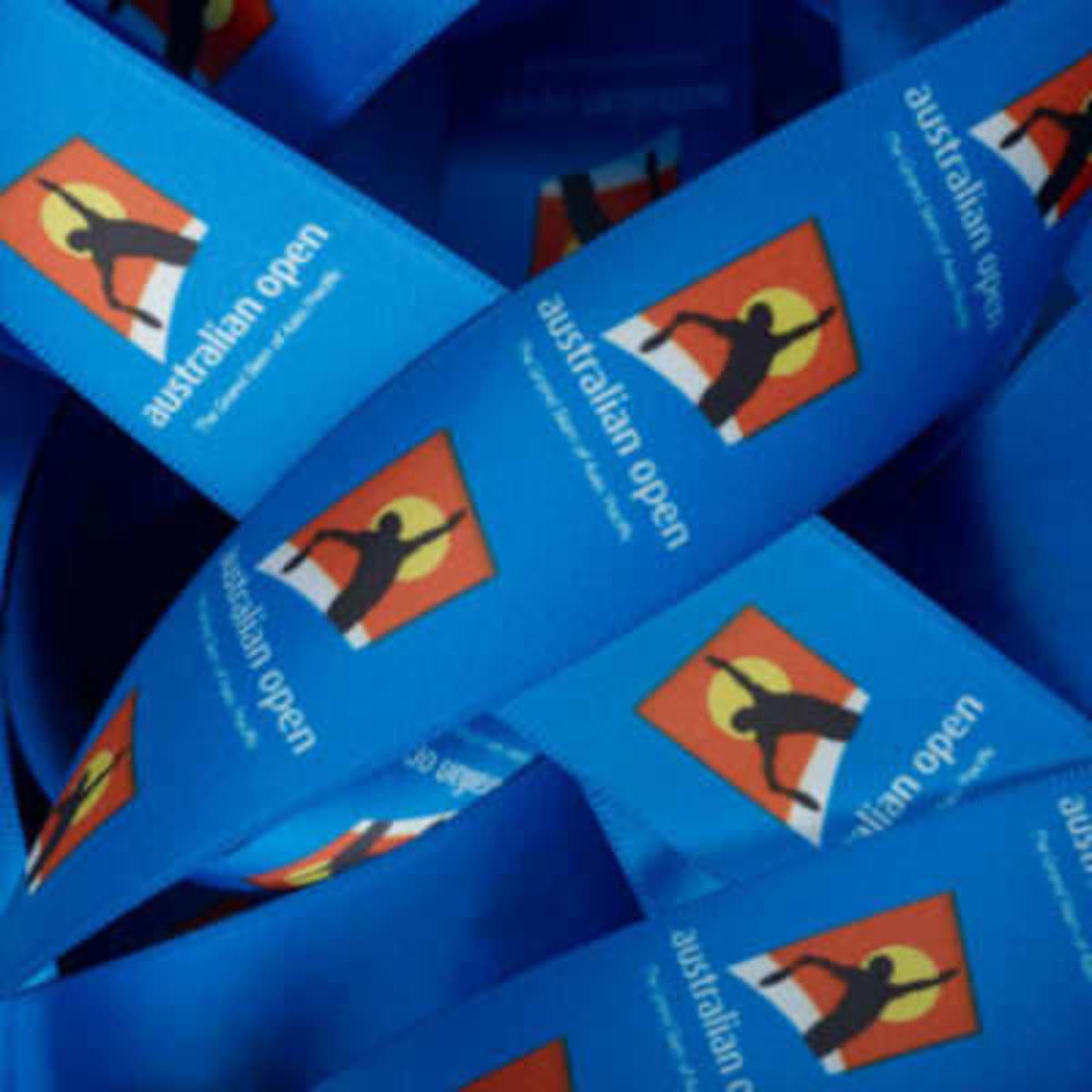 A blue ribbon with a repeated logo design, showcasing vivid colours and patterns, featuring the text "australian open".