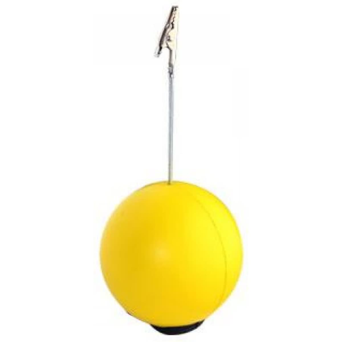 A yellow stress ball in a round shape, mounted on a metal clip with a base for holding notes.