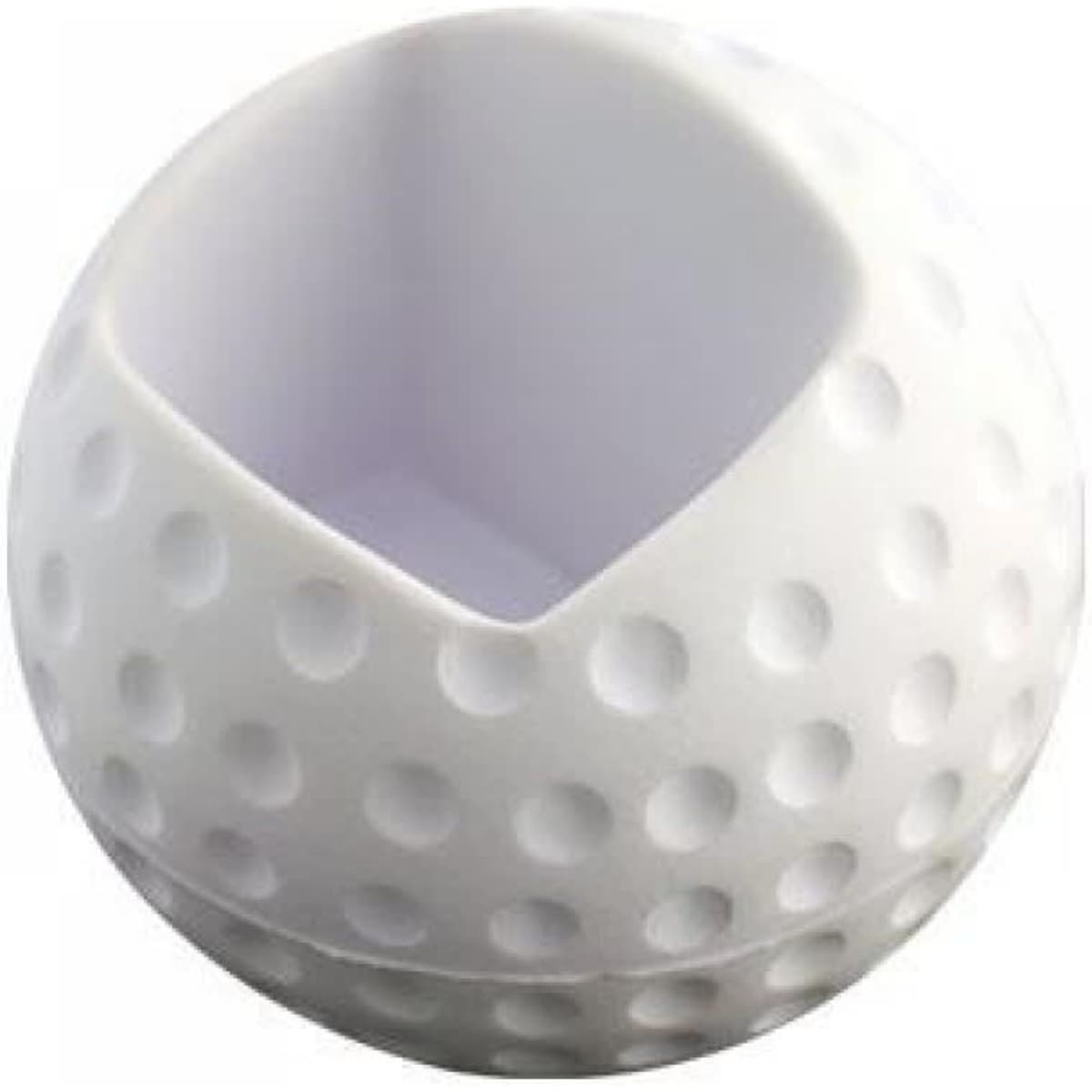 A white golf ball shaped mobile phone holder with a smooth opening at the top and a textured surface.