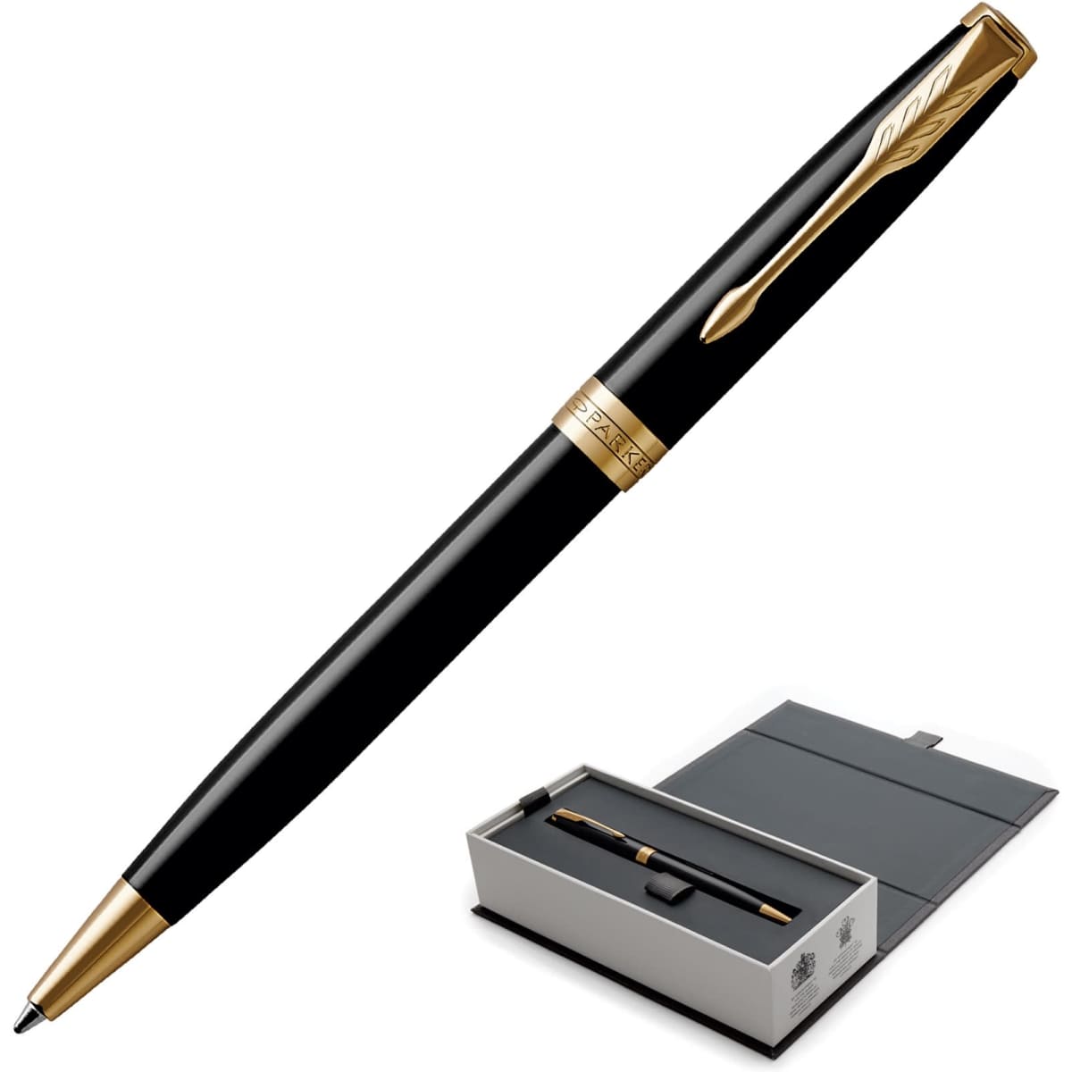 A metal ballpoint pen in lacquer black with gold trim, displayed in an elegant presentation box.