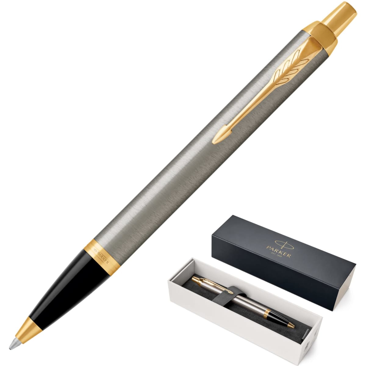 A brushed stainless steel ballpoint pen with gold accents, presented in a black box with branding.