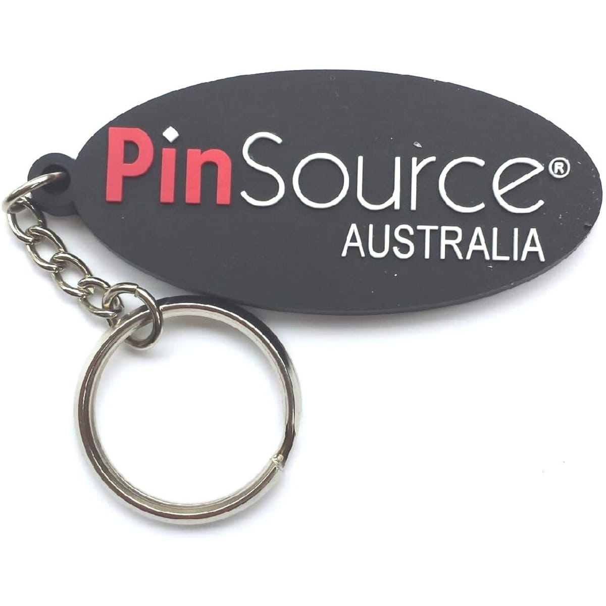 A black PVC keyring featuring a keychain loop and a logo on a smooth surface.