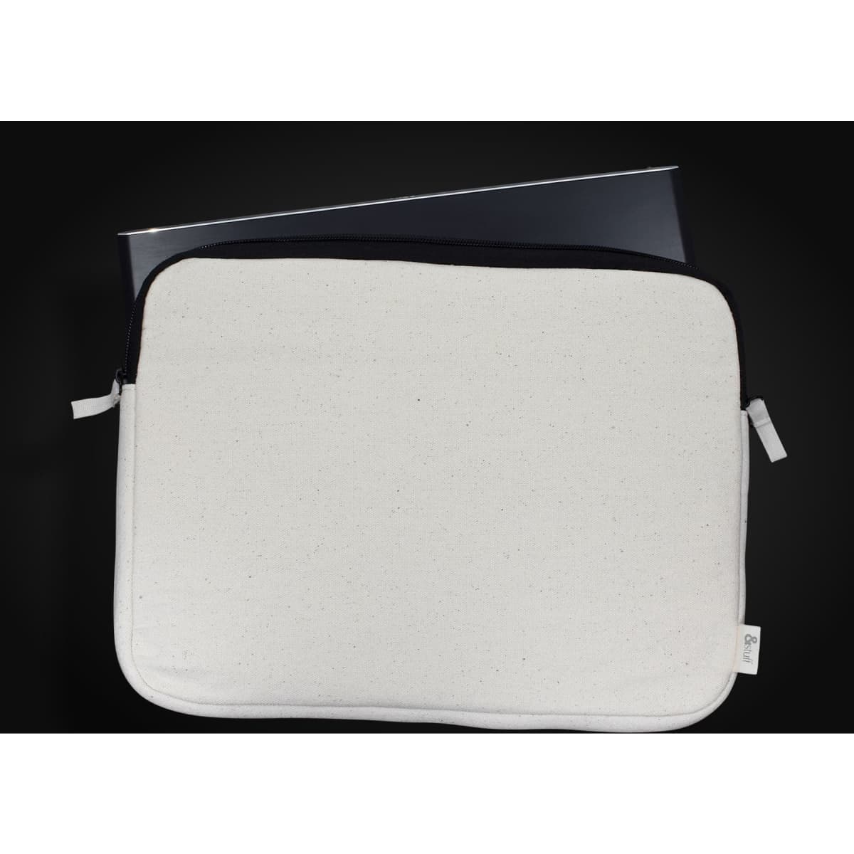 A laptop sleeve in cream and black, featuring a zip closure and a branding logo, designed for a 24cm x 33cm laptop.