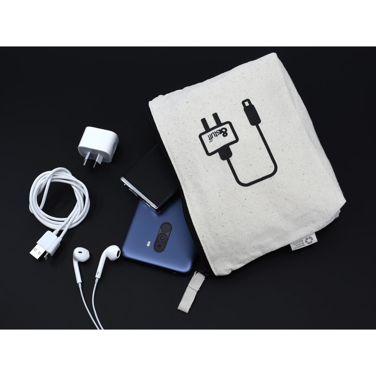 A cream-coloured tech pouch with an illustration, containing a phone, charger, earphones, and USB cable.