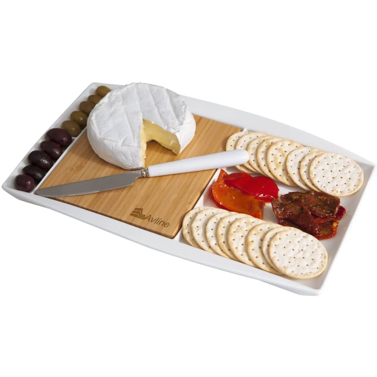A white Jumbo Party Plate featuring a round cheese, crackers, olives, sundried tomatoes, and a knife on a wooden cutting board.
