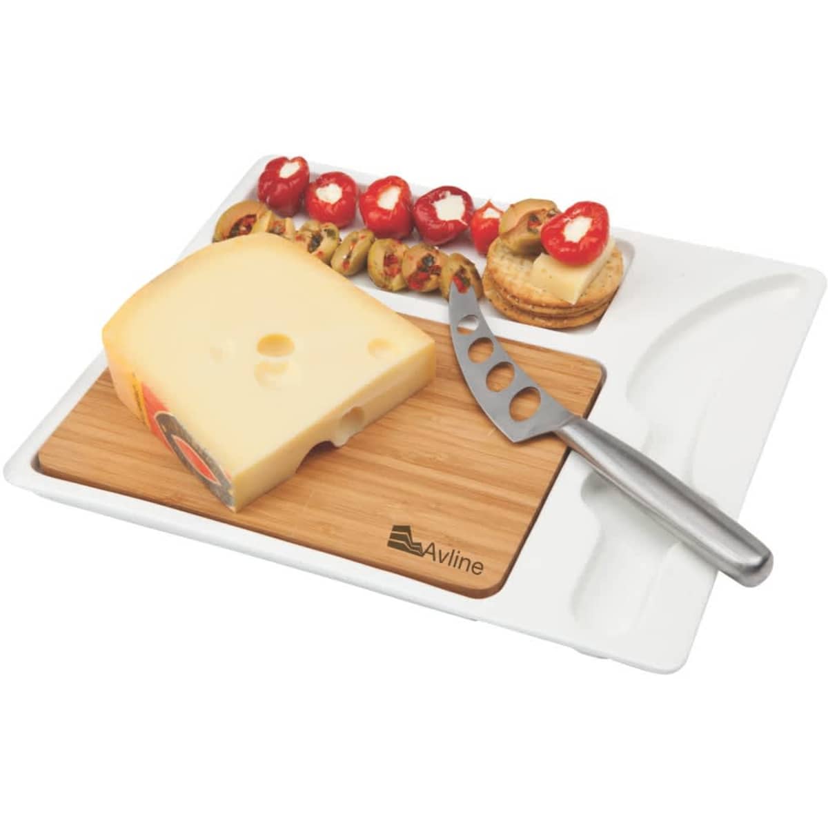 A cheese board with a wooden base, a cheese wedge, a stainless steel knife, and assorted snacks in a white tray.