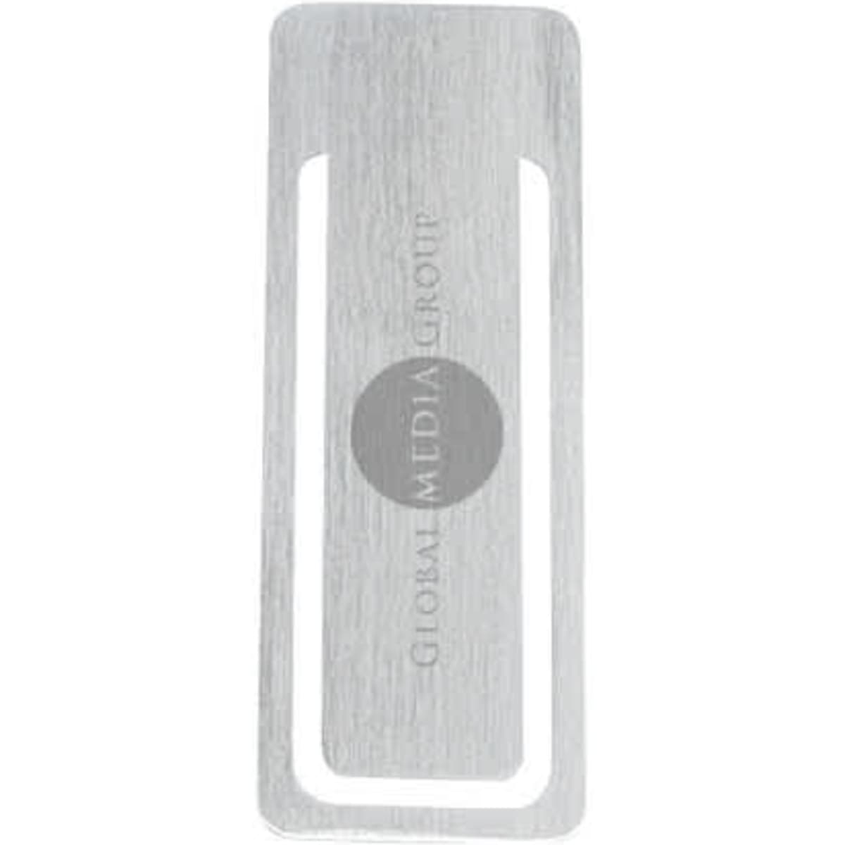 A rectangular metal clip with a brushed silver finish, featuring a circular logo in the centre.