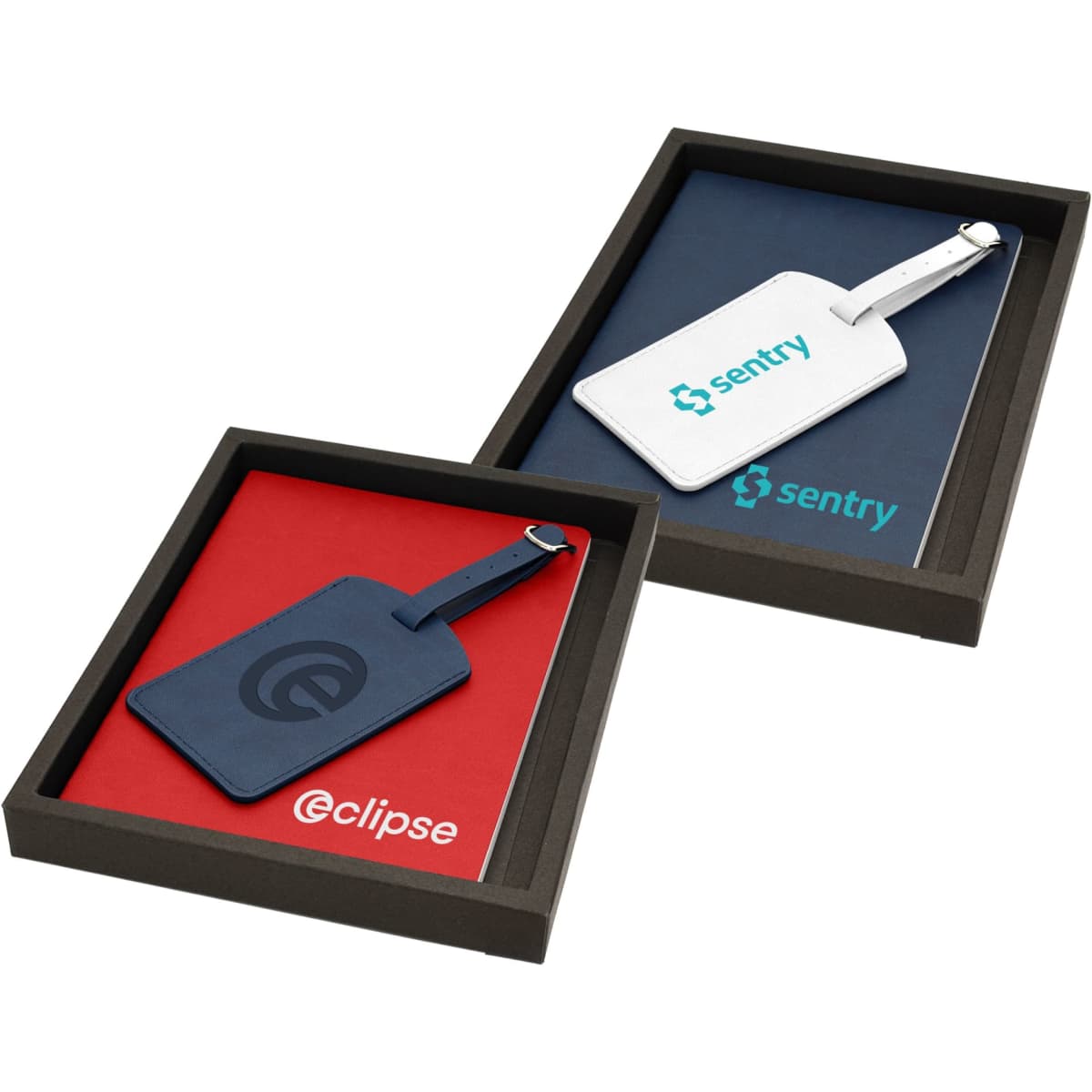A travel journal set featuring a navy blue and white cover, presented in a black box with red and blue interior.