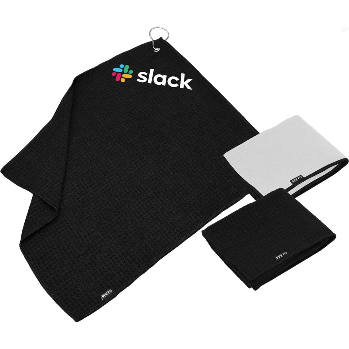 A set of black and white golf towels, featuring a logo, with one towel displaying a textured pattern and a clip.