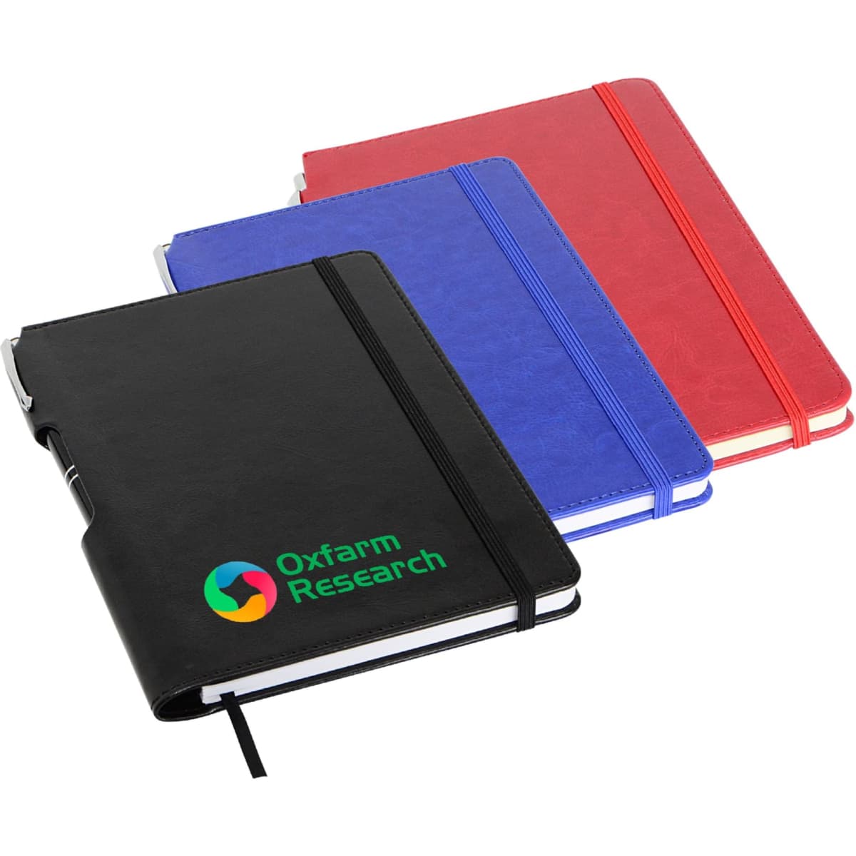 A set of three A5 notebooks in black, blue, and red, featuring an embossed logo on the black notebook.